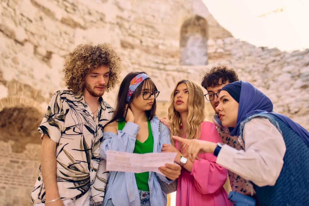 Group of tourists looking at a map