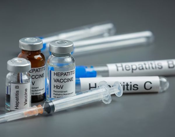 world-hepatitis-day-concept-with-medical-tools-pills-placed-gray-surface_1150-46815